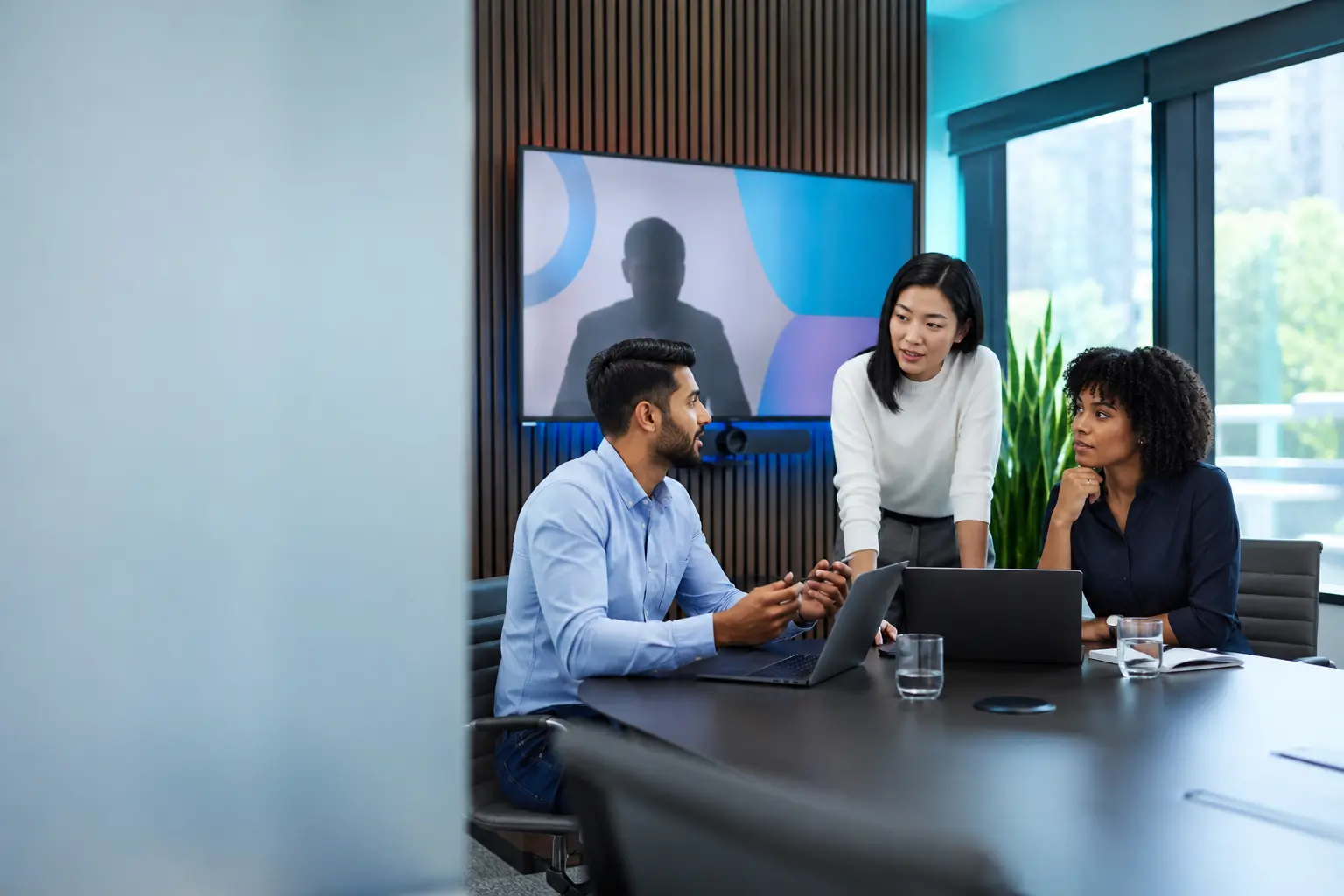 Professional services team collaborating securely using cloud-based tools.